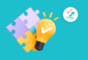 Une ampoule au premier plan avec un crochet et des pièces de casse-tête emboîtées a l'arriere